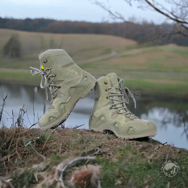 Light-colored high-top tactical boots with intricate lacing for rugged outdoor use