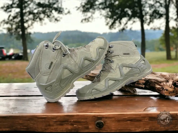 Pair of khaki tactical waterproof hiking boots for rugged outdoor adventures