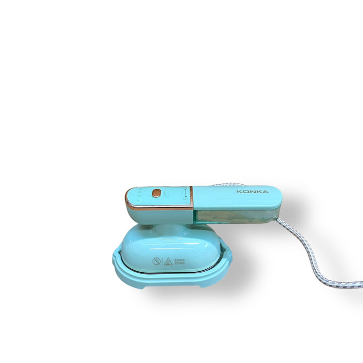 Light blue Konka Travelling Steam Iron with rose gold trim and braided cord