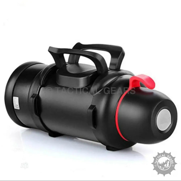 Black portable searchlight with handles and red accent, ideal travel accessories outdoor gear
