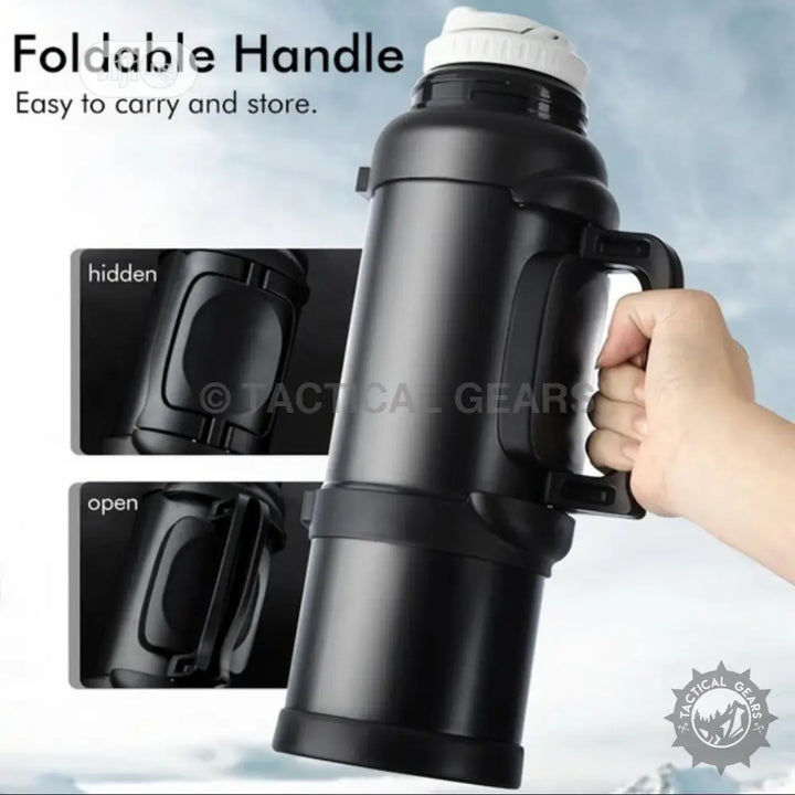 Black insulated water bottle with foldable handle, ideal travel accessory outdoor gear