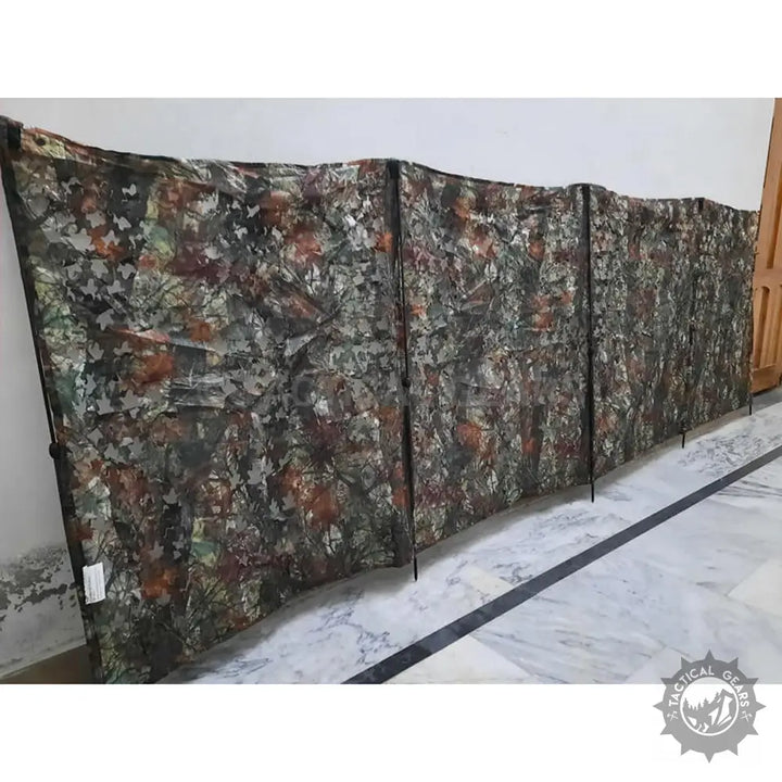 Eastman Ground Blind Morcha with foldable camouflage netting and leafy pattern
