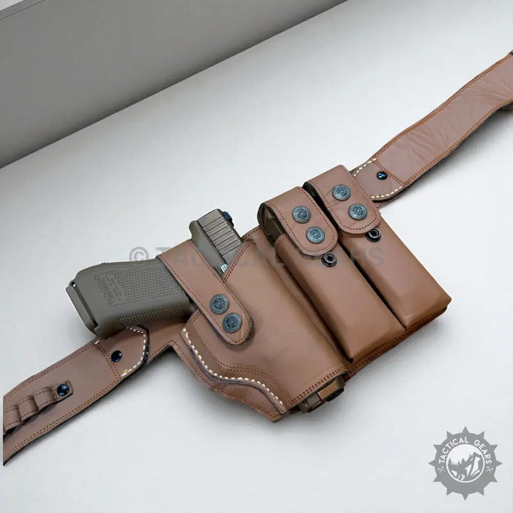 Tan leather belly holster with two magazine pouches and belt for 9mm firearms