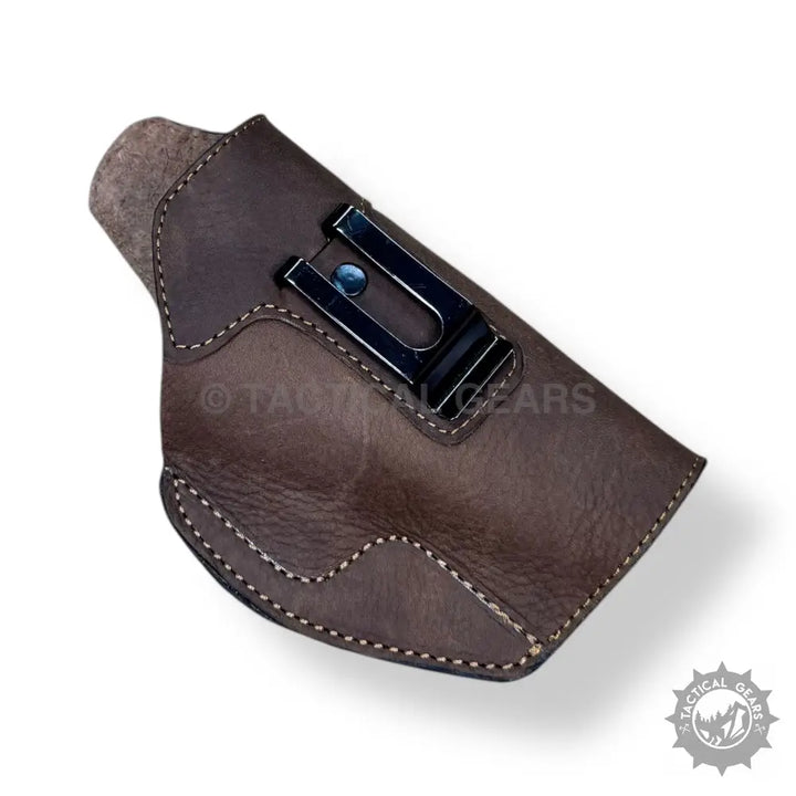 Easy-to-use brown leather gun holster for 9MM with metal belt clip and white stitching