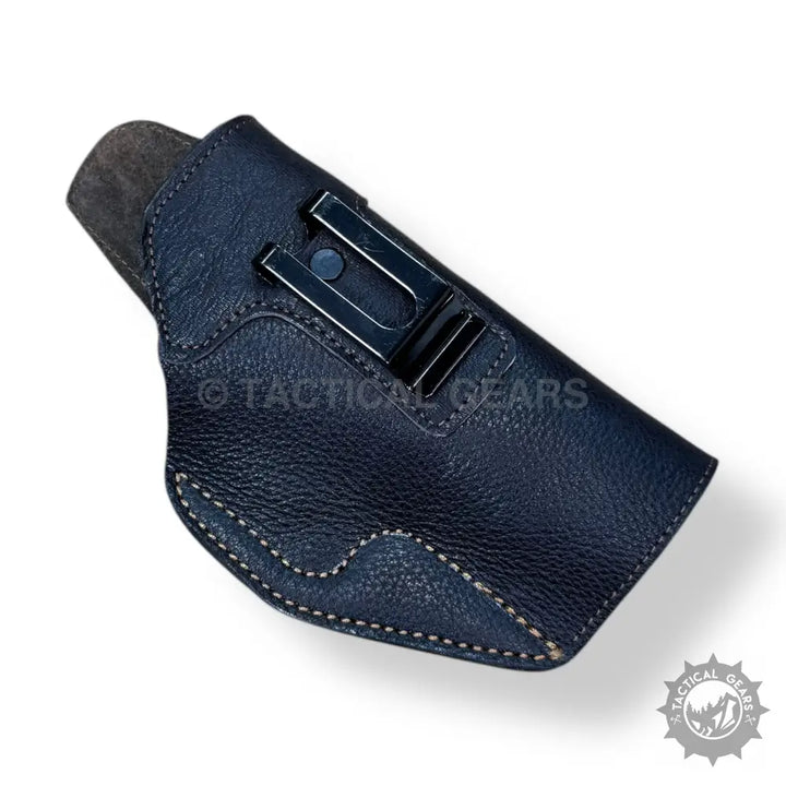Black leather gun holster with metal clip for easy carrying and 9MM pistols