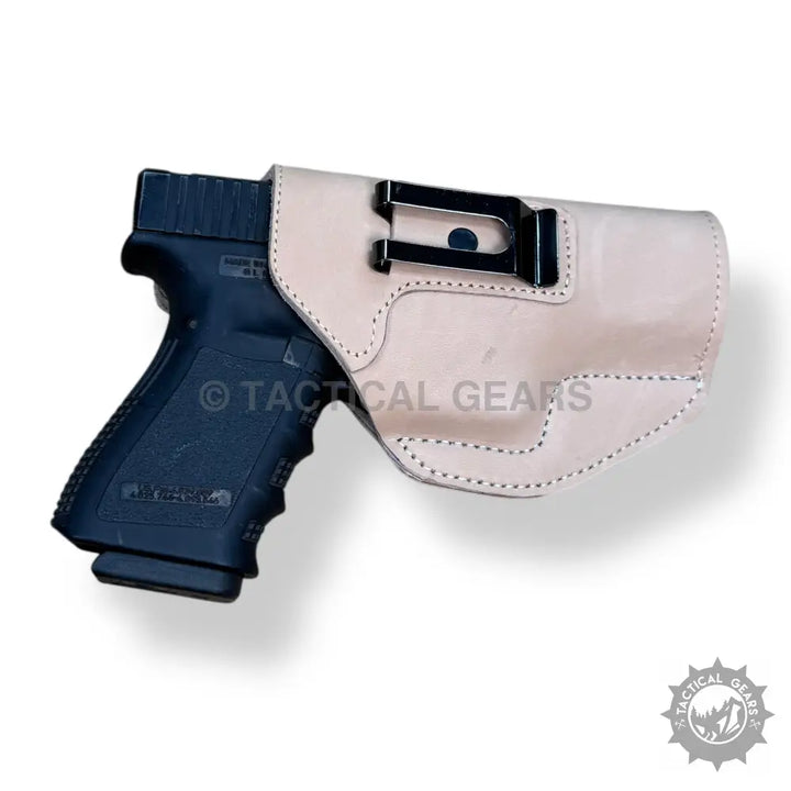 Easy-to-use Leather Holster For 9MM with black pistol in light tan leather and clip