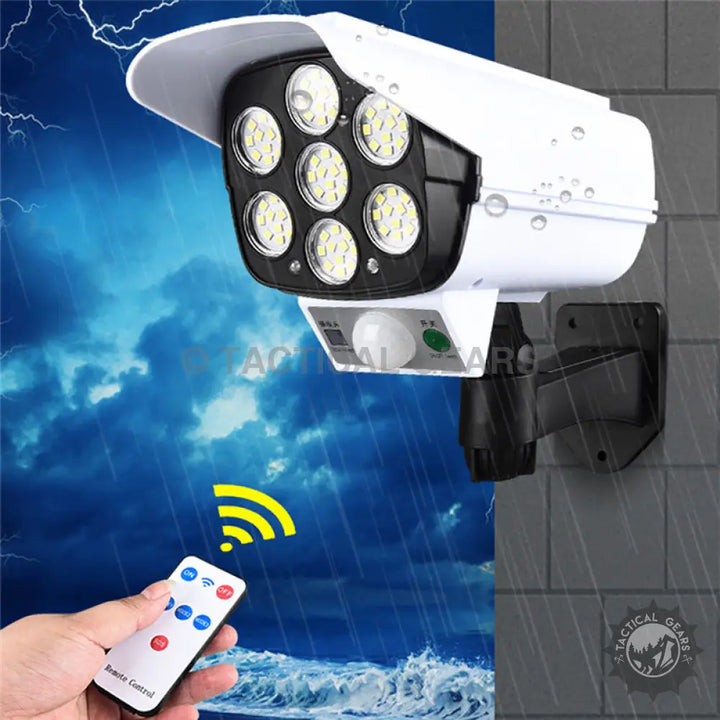 White outdoor waterproof solar light with LED fake camera, solar panel, and remote control