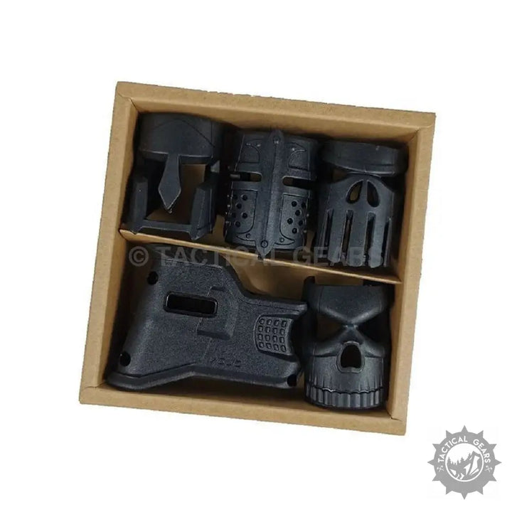 Black tactical gear accessories in a cardboard box for Magwell M4 Grip with Masks