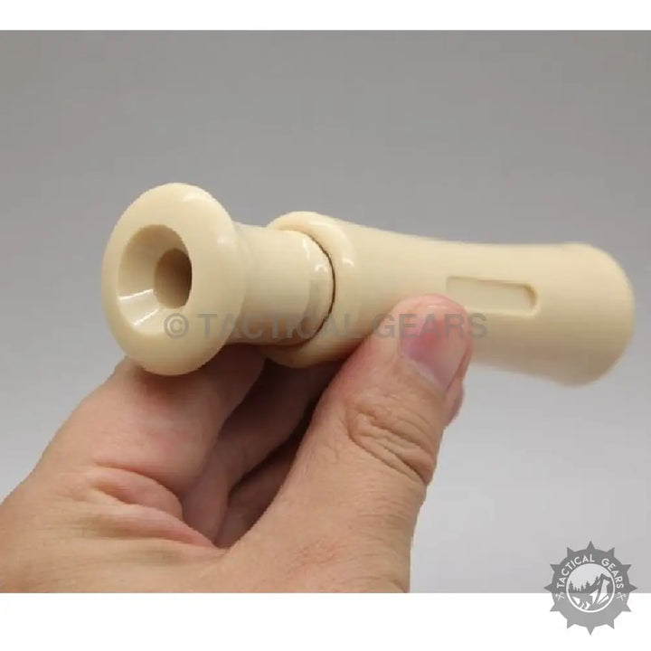 Cream-colored two-piece duck caller held in hand for hunting Mallard Duck Caller