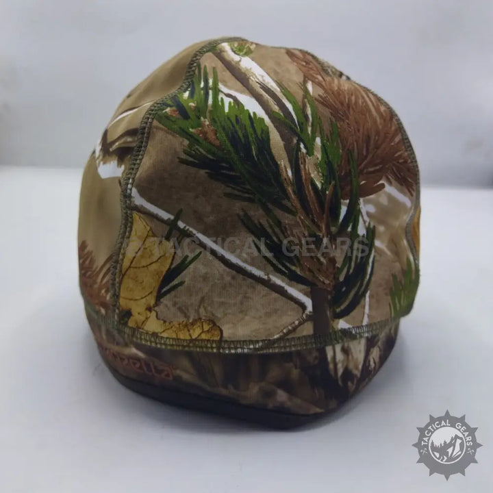 Camo beanie hat with tree and leaf pattern offering a snug fit and camouflage style