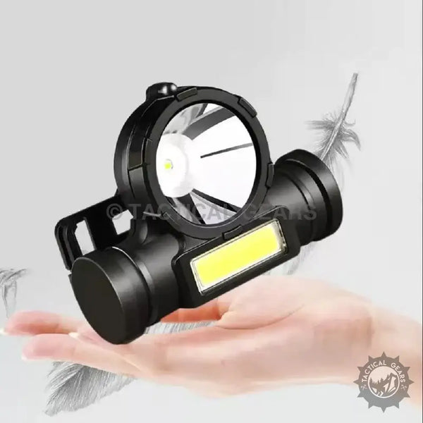 Black lightweight mini headlight with dual light sources for hands-free illumination