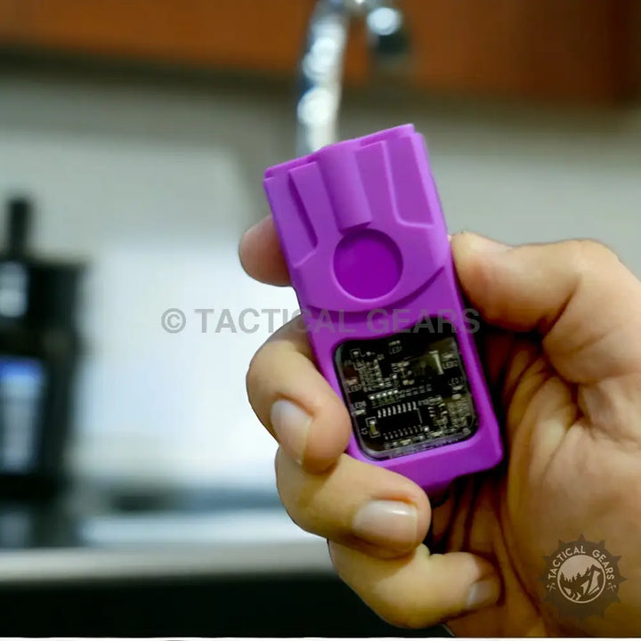 Purple waterproof electronic device with visible circuit board, Mini High Voltage Taser