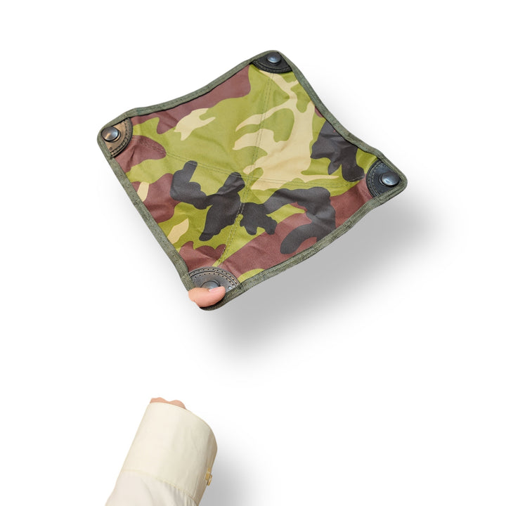 Square camouflage fabric bag with snap corners for mini portable folding camping stool