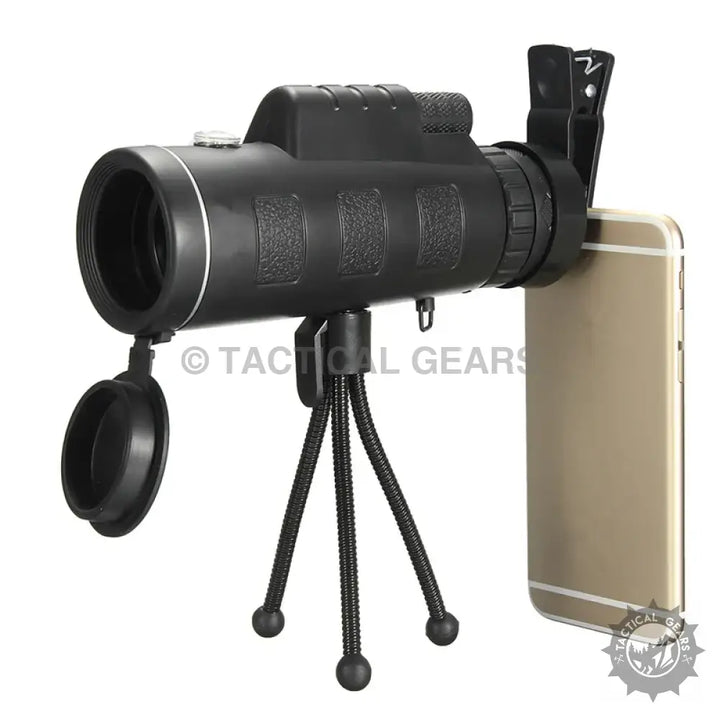 Black mobile monocular telescope with smartphone adapter and mini tripod for outdoor viewing