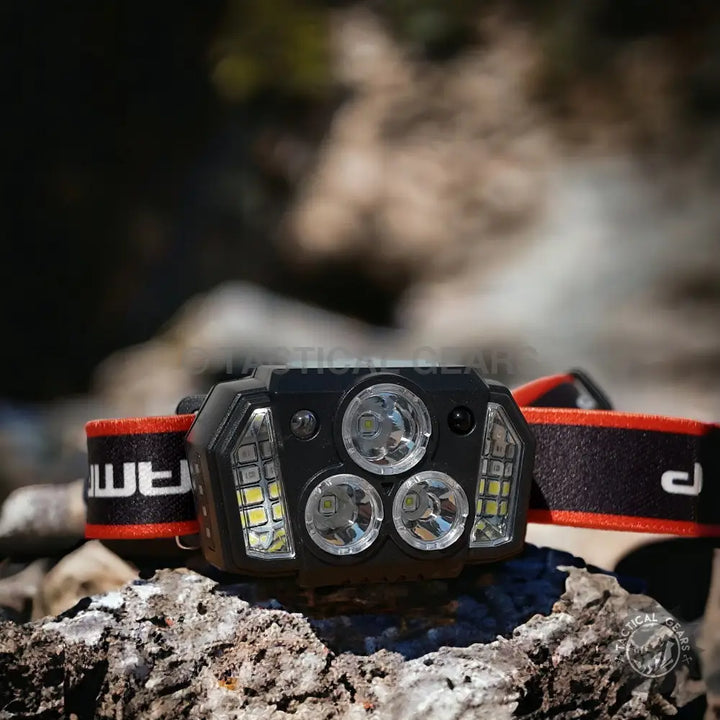 Outdoor Multi-Purpose Induction Headlight with black body and adjustable red and black strap
