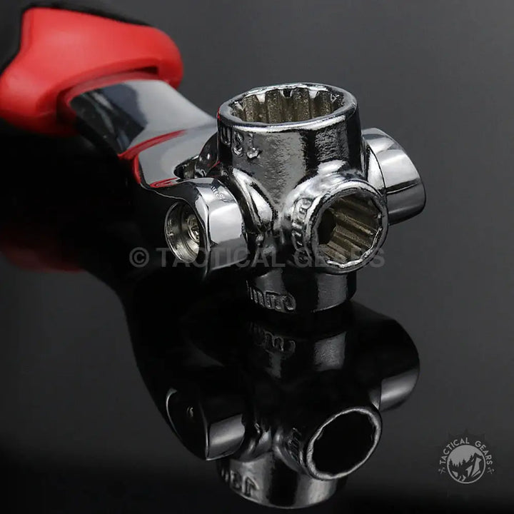 Shiny chrome universal socket wrench with red and black handle for multi-size nuts