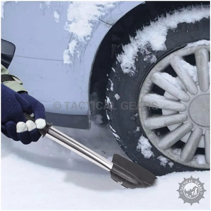 Extendable snow brush and ice scraper on Multifaceted Outdoor Camping Shovel for winter camping