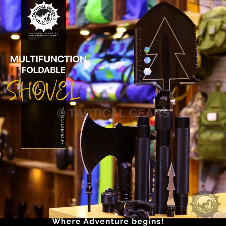Black multifunction foldable shovel with interchangeable axe, spearhead, and extension rods