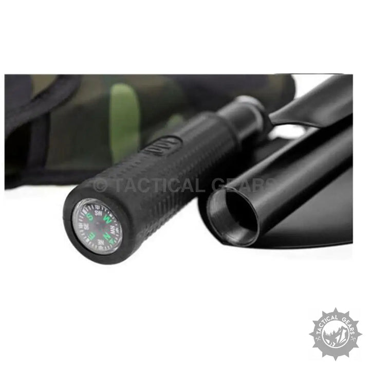 Black tactical shovel handle with integrated compass for portable camping and camping shovel use
