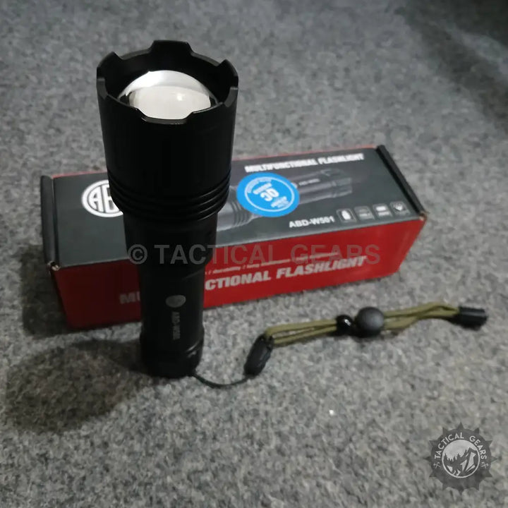 Black Multifunctional Flashlight ABD-W501 with aluminum alloy body, crenellated bezel, and lanyard, featuring rechargeable battery and versatile light source