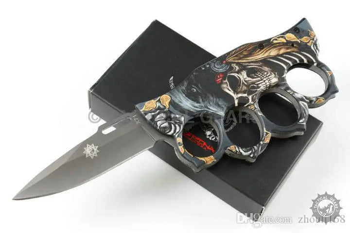 X71 Quick Open Knuckle Duster Knife with skull-themed black handle