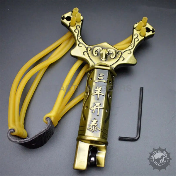 Bronze-colored hunting slingshot with ram’s head design, yellow elastic bands, and wrist brace