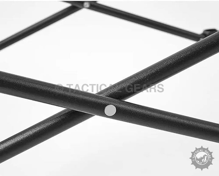 Black textured collapsible metal frame of outdoor camping folding table for outdoor activities