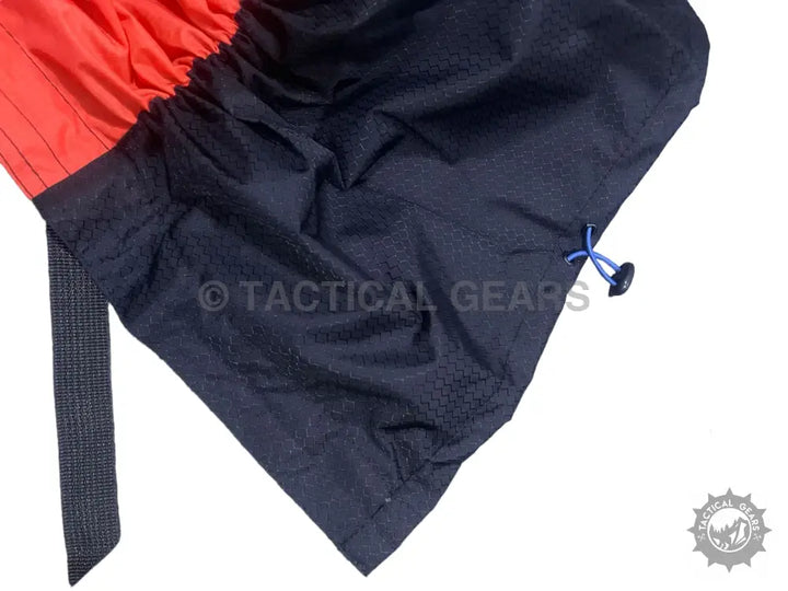 Red and black textured fabric drawstring bag for outdoor activities and hiking gear