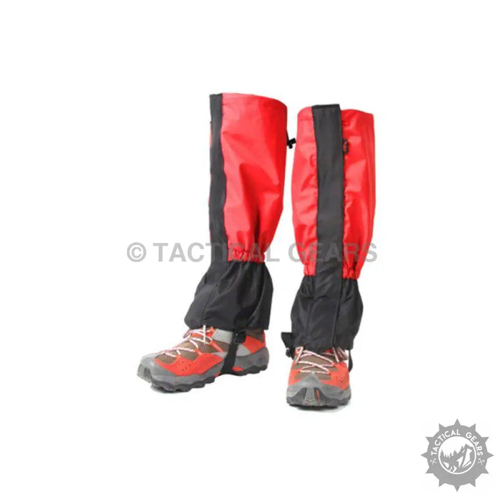 Red and black waterproof hiking gaiters covering lower legs and hiking boots for outdoor protection