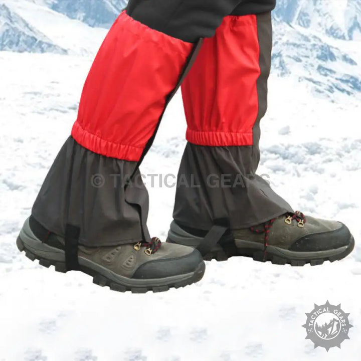 Red and black waterproof hiking gaiters over hiking boots for outdoor protection