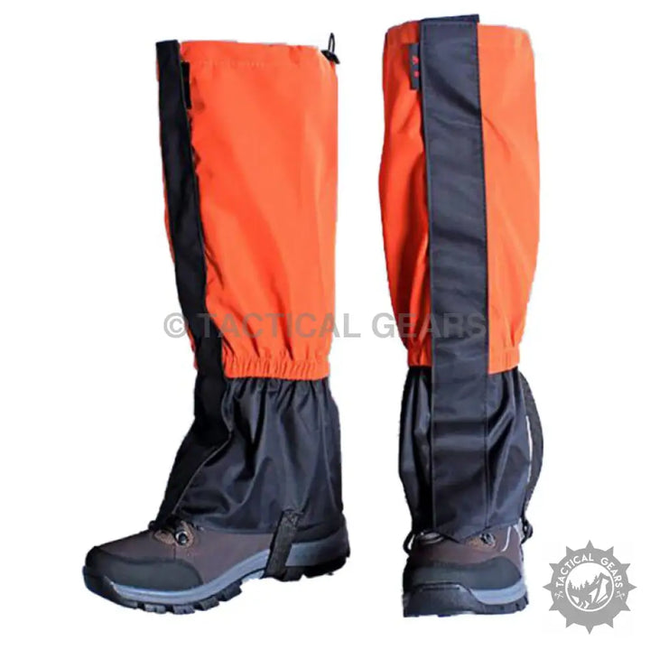 Orange and black waterproof hiking gaiters for outdoor protection and trail hiking