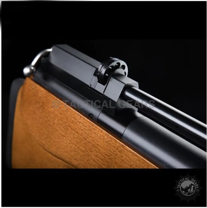 Close-up of ARTEMIS P10 Air Rifle receiver and barrel with wooden stock