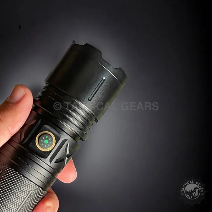 P90 Tactical Flash Light with knurled grip side power button and crenellated bezel