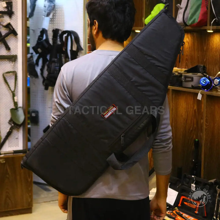 Black padded rifle bag with shoulder straps for secure transportation and storage