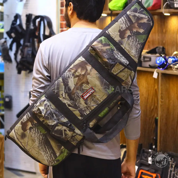 Camo rifle bag with multiple pockets and shoulder strap for easy transport