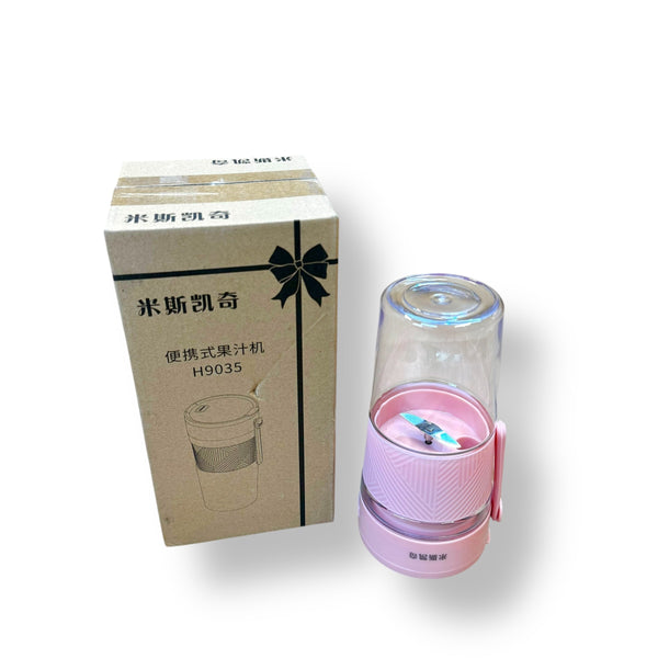 Portable pink blender with clear cup and black bow design on packaging for Personal Portable Blender