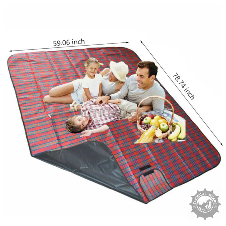 Red and black plaid picnic blanket with waterproof backing and carrying handle, perfect picnic mat