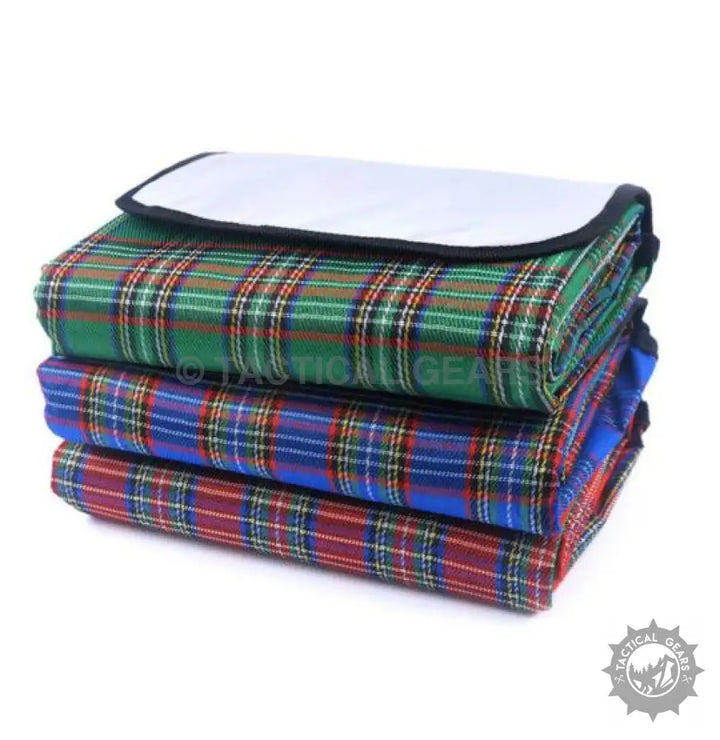 Stack of three folded plaid picnic blankets with waterproof backing, ideal picnic mats