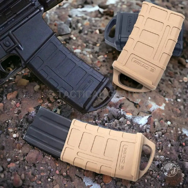 Black and tan polymer Pmag-Magazine Rubber Cover with loop-style baseplates