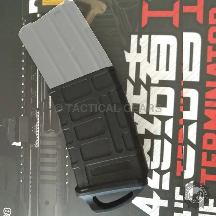 Black polymer magazine with grey follower and PMAG-Magazine Rubber Cover for durability