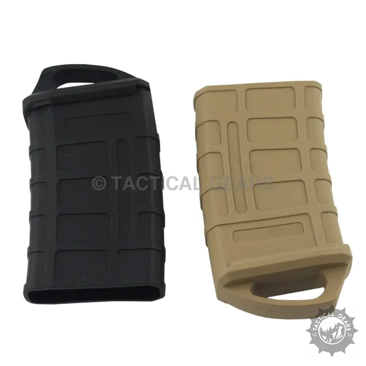 Two tactical magazine pull covers, black and tan, for PMAG Magazine Rubber Cover