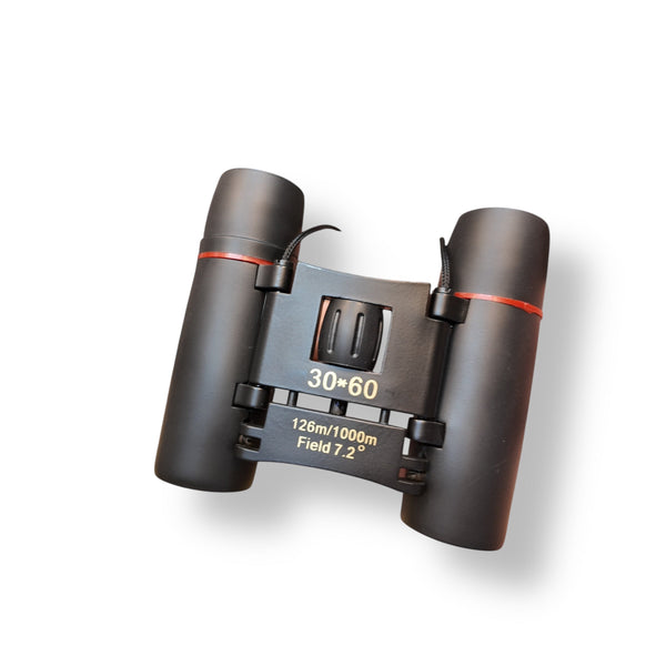 Black compact pocket size binoculars with red accents and central focusing wheel