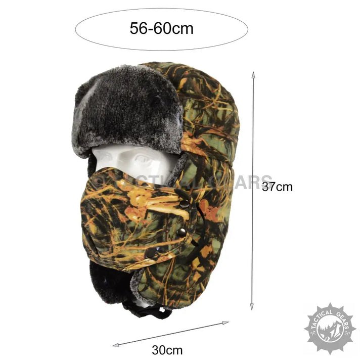 Camo trapper ski hat with black faux fur trim and attached face mask for staying warm