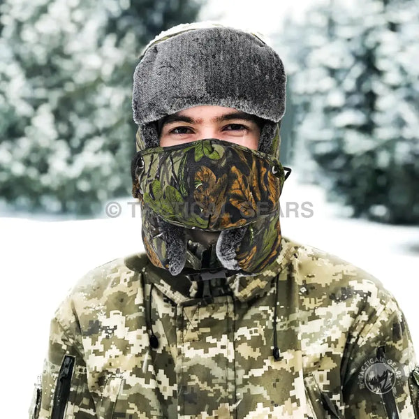 Winter camouflage balaclava with fur hat designed to stay warm as a polyester ski hat