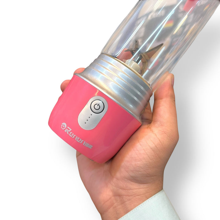 Portable 420ml Blender with pink base, clear blending cup, and power button with battery indicator
