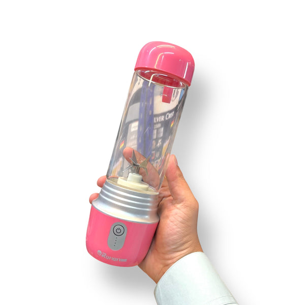 Pink portable 420ml blender with clear mixing cup and power button for smoothies