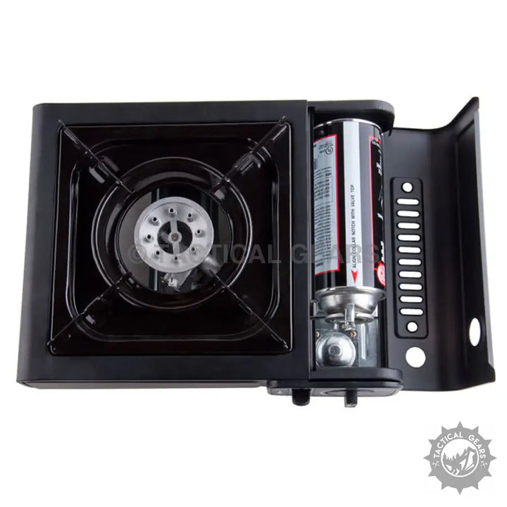 Black portable butane gas stove with single burner and integrated fuel canister compartment