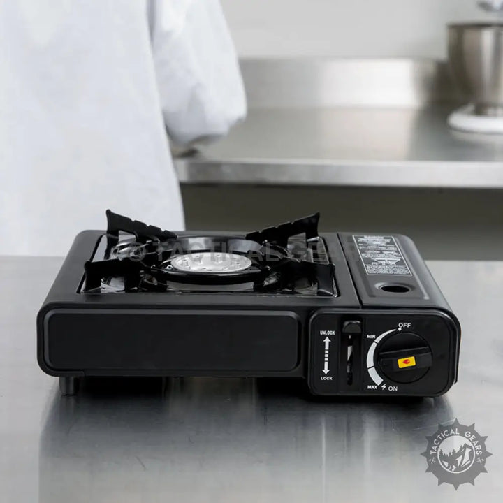 Portable butane gas stove with a black finish, ideal for outdoor cooking and camping