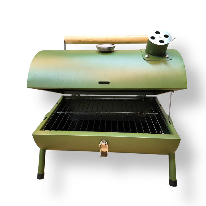 Portable green charcoal BBQ grill with wooden handle, built-in thermometer, and side vent