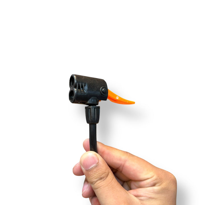 Black bicycle pump head with orange lever on imported mini foot pump for multiple valves